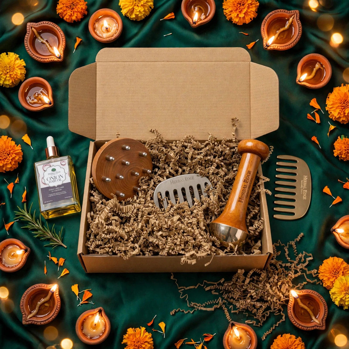 Herbal Edge Diwali gift flatlay: kansa gift box, Onion Hair Oil, kansa wand and comb with diyas and marigolds