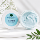 Jojoba face cream jar with visible cream swirl and 'Herbal Edge' branding on a light background.